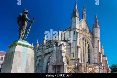 Winchester,Hampshire,England,UK-August 20 2020: The bronze statue of a Great War soldier stands about 25m to the north-west of the west front of Winch Stock Photo