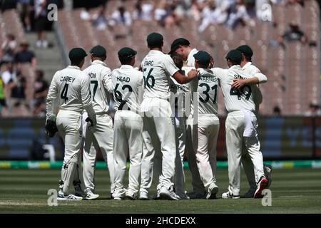 MELBOURNE, AUSTRALIA - DECEMBER 28: Scott Boland of Australia celebrates the wicket of Mark Wood of England during the Boxing Day Test Match in the Ashes series between Australia and England at The Melbourne Cricket Ground on December 28, 2021 in Melbourne, Australia. Image Credit: brett keating/Alamy Live News Stock Photo