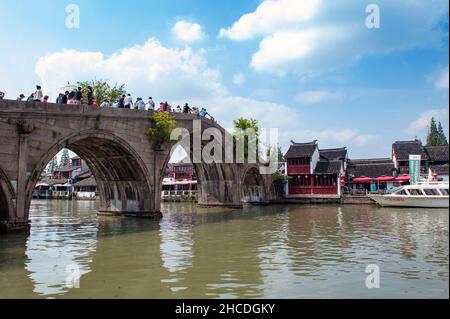 Fangsheng Bridge over the Dianpu River in Zhujiajiao Ancient Water Town, a historic village and famous tourist destination in Shanghai, China Stock Photo