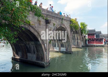 Fangsheng Bridge over the Dianpu River in Zhujiajiao Ancient Water Town, a historic village and famous tourist destination in Shanghai, China Stock Photo