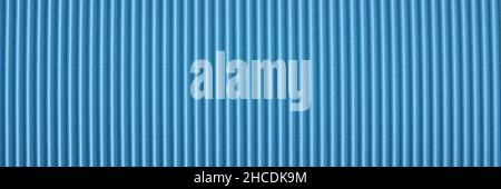 Closeup of blue striped perforated paper background Stock Photo