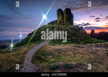Path to the former main tower – inside the ruins of the citadel of Siria. Photo taken on 10th of July 2021, near Siria village, Arad County, Romania. Stock Photo