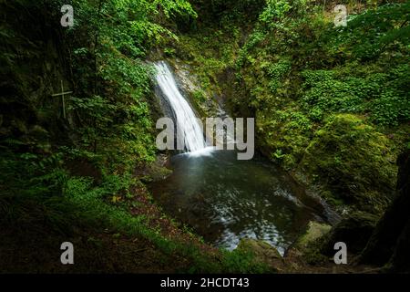 The Virgin Mary waterfall encountered during a hike through Cerna Valley. Photo taken on 31st of May 2021, near Heculane, in the National Park Domogle Stock Photo