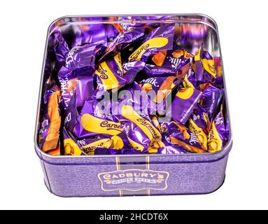 Norwich, Norfolk, UK – December 2021. Top down view of Cadbury chocolate bars, comprising Dairy Milk chocolate, Whole Nut and Caramel Stock Photo