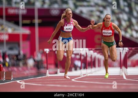 Annie Kunz participating in the 100-meter hurdles of the heptathlon at the Tokyo 2020 Olympic Games. Stock Photo