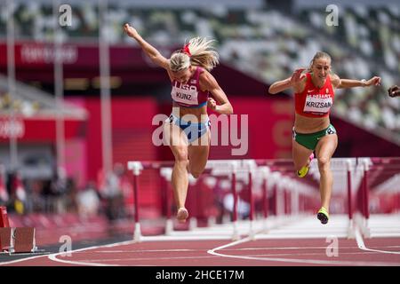 Annie Kunz participating in the 100-meter hurdles of the heptathlon at the Tokyo 2020 Olympic Games. Stock Photo