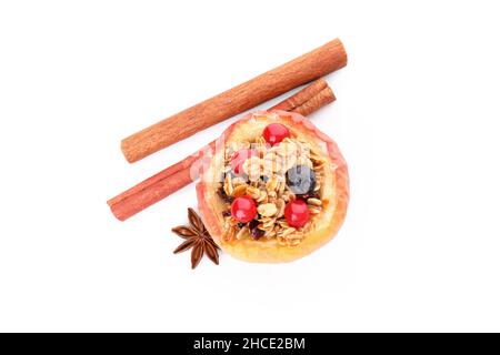 Baked apple with cinnamon isolated on white background Stock Photo
