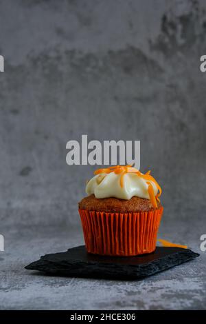 carrot muffin on a gray background Stock Photo