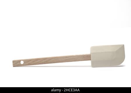 Close up of a rubber dough spatula wood wooden handle isolated on white background Stock Photo