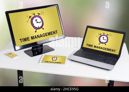 Time management concept shown on different information technology devices Stock Photo