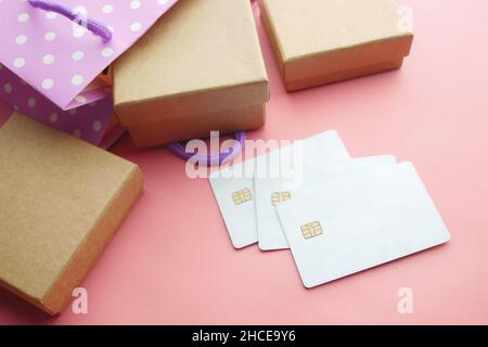 credit cards and gift box on pink background  Stock Photo