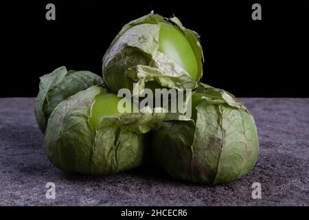 Fresh Tomatillos on a dark background. Stock Photo