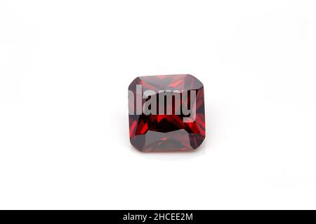 Closeup of a red ruby gemstone isolated on a white background Stock Photo