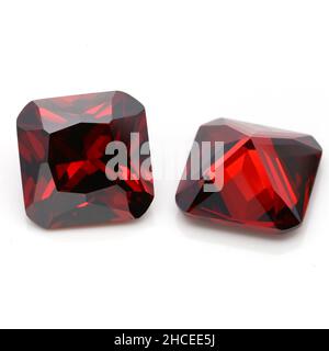 Closeup of red ruby gemstones isolated on a white background Stock Photo