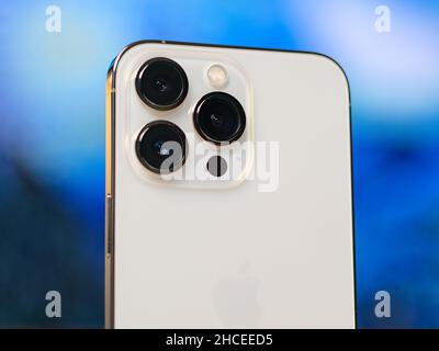 HCMC, Vietnam - August 19, 2021: View of new iPhone 13 or iPhone 13 Pro and Apple Airpods for editorial use Stock Photo