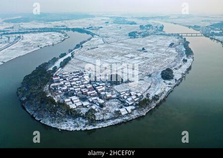 Yichun. 27th Dec, 2021. Aerial photo taken on Dec. 27, 2021 shows the winter scenery in Yichun, east China's Jiangxi Province. Credit: Chen Qihai/Xinhua/Alamy Live News Stock Photo