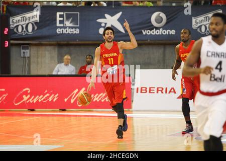 A Coruña, Spain. Ricky Rubio disputes the ball during the friendly basketball match between Spain and Canada at the Coliseum in A Coruña Stock Photo