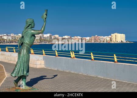 Torrevieja promenade bronze sculpture, goodbye to fishermen, by Carmen Fraile, (Monument to the Sailor's Woman ), Alicante province, Spain, Europe Stock Photo