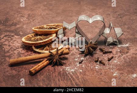 Cookie cutters and spices Stock Photo
