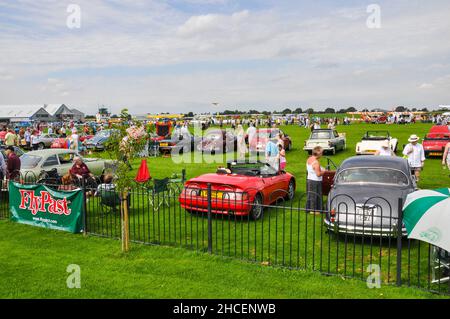 Sywell Jubilee Airshow 2012, at Sywell Aerodrome, Northamptonshire, UK. Busy with people and classic cars Stock Photo