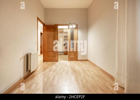 Empty room with walk-in closet at the back Stock Photo