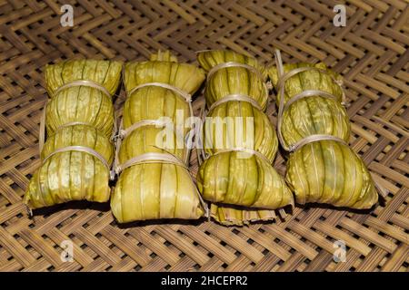 Myanmar or Burmese traditional street food, glutinous rice zongzi. Stock Photo