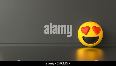 Smile in love emoji ob dark gray background, social media and communications concept image, banner size, copyspace for your individual text. Stock Photo