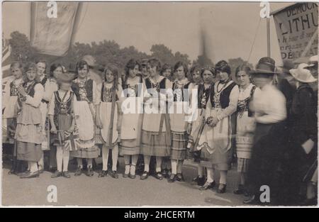 Girls in national dress at the Lithuanian artists exhibition dedicated ...