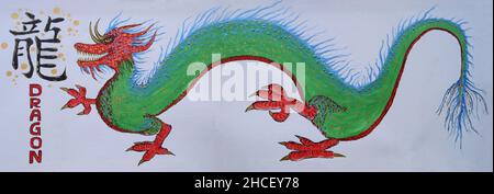 Painting of a green Chinese dragon with red, blue and gold accents.The black Chinese character stands for dragon Stock Photo