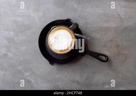 Top view of cappuccino coffee on a gray surface Stock Photo