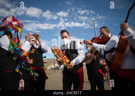 Malaga, Spain. 28th Dec, 2021. Participants dressed in traditional costumes rehearsing before, during the festival. The 59th edition of Verdiales Flamenco Dance contest, an important cultural and music festival from rural origin, its celebrated annually on Fools Saints Day. Musicians from different musical groups known as 'pandas' compete in a contest singing and dancing style of flamenco music called 'Verdiales' using musical instruments typical of the Andalusian popular folklore. (Photo by Jesus Merida/SOPA Images/Sipa USA) Credit: Sipa USA/Alamy Live News Stock Photo