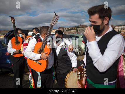 Malaga, Spain. 28th Dec, 2021. Participants dressed in traditional costumes seen during the festival. The 59th edition of Verdiales Flamenco Dance contest, an important cultural and music festival from rural origin, its celebrated annually on Fools Saints Day. Musicians from different musical groups known as 'pandas' compete in a contest singing and dancing style of flamenco music called 'Verdiales' using musical instruments typical of the Andalusian popular folklore. (Photo by Jesus Merida/SOPA Images/Sipa USA) Credit: Sipa USA/Alamy Live News Stock Photo