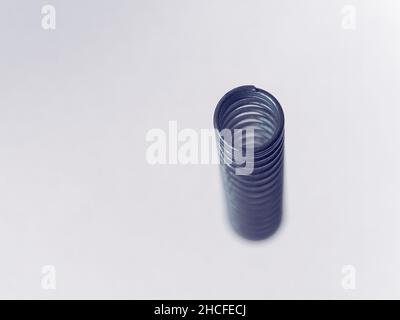 Close-up picture of a rusty gold and silver screw on a white background Stock Photo