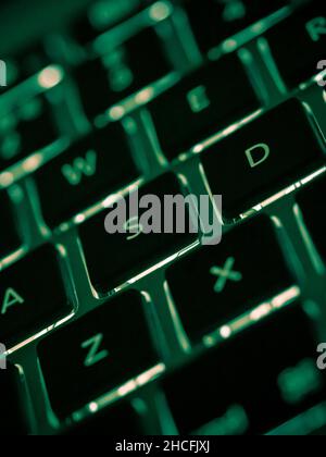Angled view close up of illuminated keyboard on computer Stock Photo