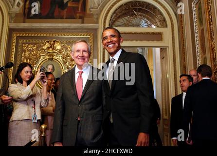 Washington, Dc, USA. 31st July, 2013. U.S. President Barack Obama arrives with Senate Majority Leader Harry Reid (L), to meet with the Senate Democratic Caucus at the United States Capitol on July 31, 2013 in Washington, DC. He is expected to talk about issues including voting rights, health care, job creation and economy. (Photo by Aude Guerrucci/Pool/Sipa USA) Credit: Sipa USA/Alamy Live News Stock Photo