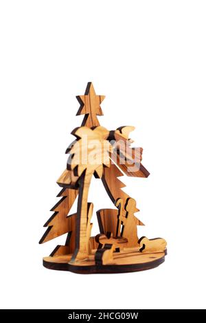 Carved wooden Nativity scene with Jesus isolated on white background Stock Photo