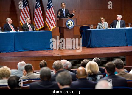 United States President Barack Obama speaks to members of the House Democratic Caucus during a visit to Capitol Hill, Saturday, March 20, 2010. The President is visiting Congress on the eve of the House vote on the healthcare reform bill. He is joined on stage by U.S. House Majority Leader Steny Hoyer (Democrat of Maryland), left, U.S. Senate Majority Leader Harry Reid (Democrat of Nevada), center left, U.S. House Speaker Nancy Pelosi (Democrat of California), center right, and U.S. Representative John B. Larson (Democrat of Connecticut), right. Credit: Kristoffer Tripplaar/Pool via CNP Stock Photo