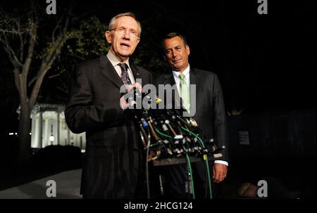 Washington, DC. 6th Apr, 2011. United States House Speaker John Boehner, right, and U.S. Senate Majority Leader Harry Reid, left, make a statement after meeting with President Barack Obama at the White House, Wednesday, April 6, 2011 in Washington, DC. President Obama invited Boehner and Reid for a late meeting Wednesday night to discuss ongoing negotiations on a funding bill to fund the U.S. Government through the end of the fiscal year.Credit: Olivier Douliery/Pool via CNP/dpa/Alamy Live News Stock Photo