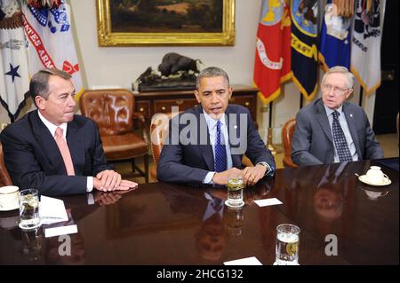 Washington, DC. 16th Nov, 2012. United States President Barack Obama, center, makes remarks to the press pool as he meets with a bipartisan group of congressional leaders including Speaker of the U.S. House John Boehner (Republican of Ohio), left, and U.S. Senate Majority Leader Harry Reid (Democrat of Nevada), right, in the Roosevelt Room of the White House on November 16, 2012 in Washington, DC. Credit: Olivier Douliery/Pool via CNP/dpa/Alamy Live News Stock Photo