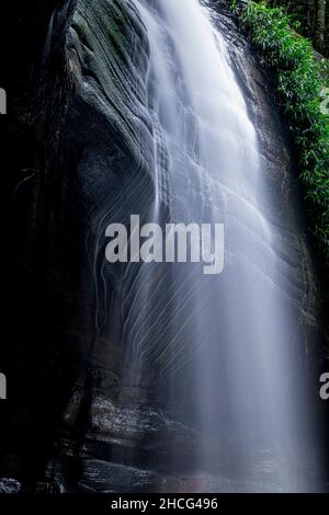 Close up view of Buderim Falls, also known as Serenity Falls is a small waterfall on the Sunshine Coast, Queensland. Stock Photo