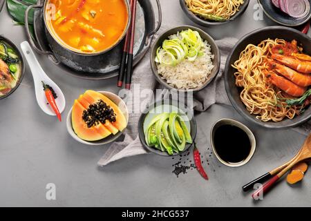 Asian dishes variety on gray background. Traditional food cocnept. Top view, flat lay, copy space Stock Photo