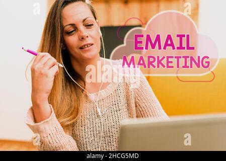 Writing displaying text Email Marketing. Business approach Sending a commercial message to a group of showing using mail Browsing And Chatting In Stock Photo