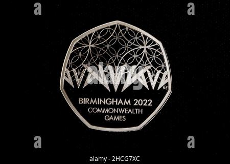A Birmingham 2022 Commonwealth Games on a 50p coin, part of the release of five new Royal Mint coin designs for 2022, celebrating key events and anniversaries throughout the year, including a 50p and a £5 crown in celebration of The Queen's Platinum Jubilee. Each of the coins features a new and unique design by a commissioned artist and the obverse portrait of Her Majesty the Queen, designed by Jody Clark. Issue date: Wednesday December 28, 2021. Stock Photo