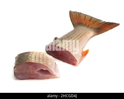 Two pieces of red-finned mullet isolated on a white background Stock Photo