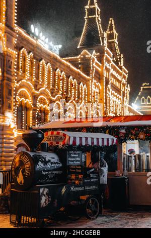 Christmas fair in Moscow in a winter atmosphere, golden garland illumination Stock Photo