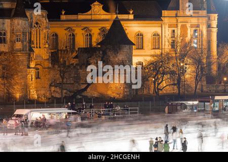 2021.12.20. Budapest, Hungary. The biggest Ice rink in Budapest Hungary. Amazing recreation place for tourist and citizens too. Blurred moving people Stock Photo