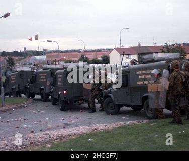 File photo dated 06/07/97 of soldiers and their armoured vehicles on the Garvaghy Road in Drumcree after the announcement of the RUC Chief Constable's decision to allow the Orange Parade to go ahead. An Irish Government official asked an NIO minister about speculation that the British Army was 'measuring' the Garvaghy Road in Portadown for bollards at the height of the marching dispute in 1997, according to newly released documents from the National Archives. Issue date: Wednesday December 29, 2021. Stock Photo