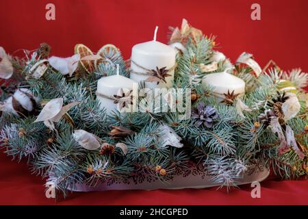 composition candles festively decorated for christmas. greeting card Stock Photo