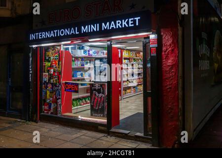 International mini market open early on Wellingborough road, Northampton, England, UK Stock Photo