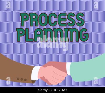 Writing displaying text Process Planning. Business approach the development of goals strategies task lists etc Two Men Drawing With Paper Background Stock Photo